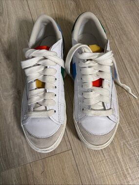 Nike White Low-Top Sneakers with Green and Blue Swooshes